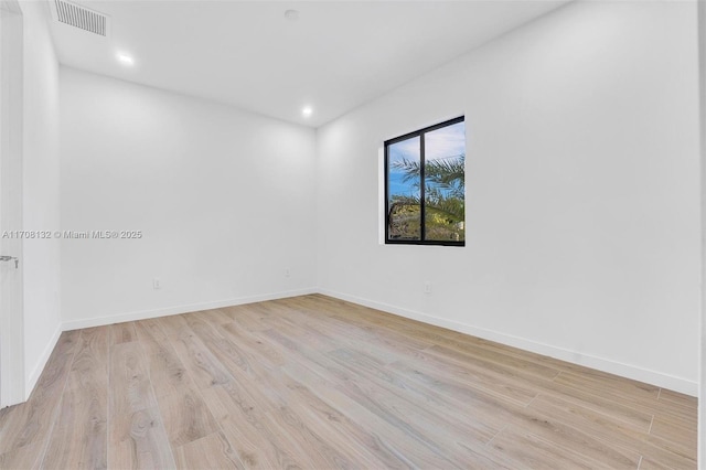 6401 SW 84th St, South Miami, FL 33143 - unfurnished room featuring light wood-style flooring and recessed lighting