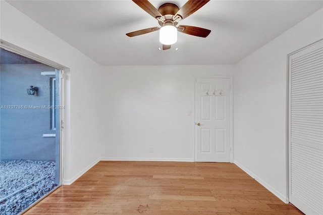 spare room with ceiling fan and light hardwood / wood-style floors