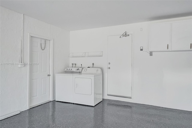 washroom with separate washer and dryer