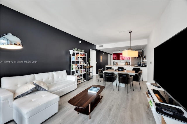 living room with light hardwood / wood-style flooring