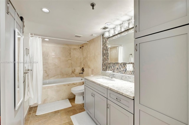 full bathroom with vanity, toilet, and shower / bath combo with shower curtain