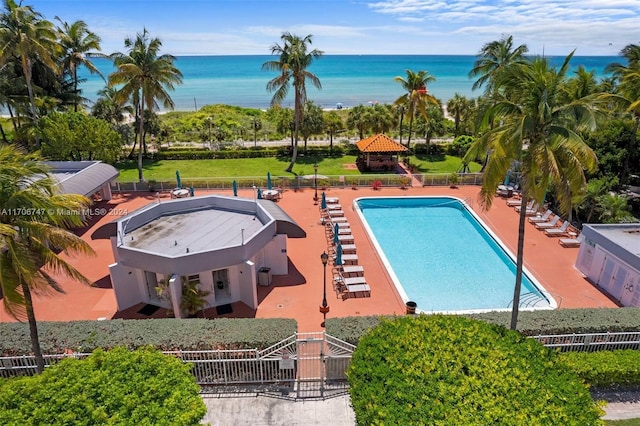 view of pool featuring a gazebo, a patio area, and a water view