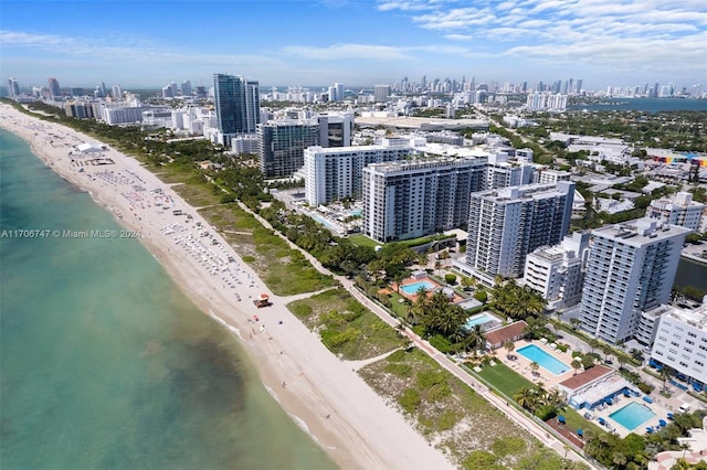 bird's eye view with a view of the beach and a water view