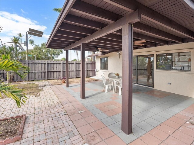 view of patio featuring ceiling fan