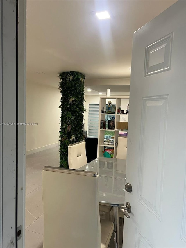 office area featuring light tile patterned flooring