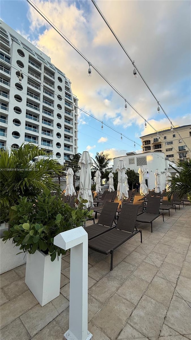 view of patio terrace at dusk