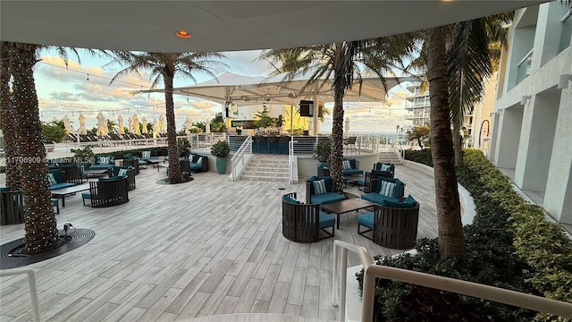 view of patio terrace at dusk