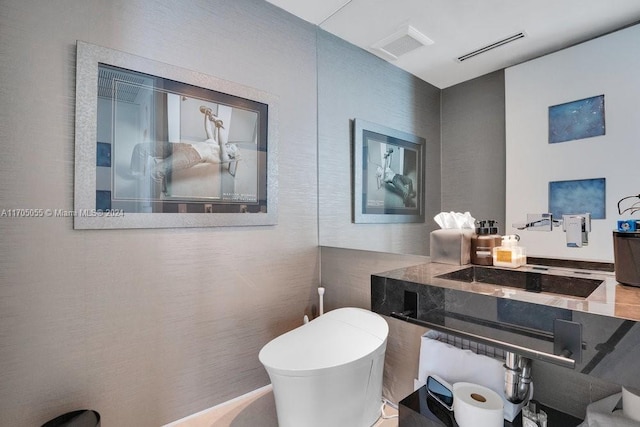 100 S Pointe Dr Unit 3601, Miami Beach, FL 33139 - bathroom featuring toilet and vanity