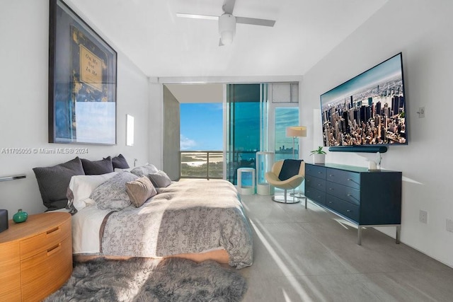 bedroom with concrete flooring and ceiling fan