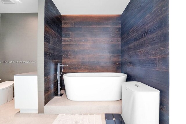 100 S Pointe Dr Unit 3601, Miami Beach, FL 33139 - bathroom featuring a freestanding tub and toilet