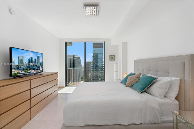 bedroom with a notable chandelier