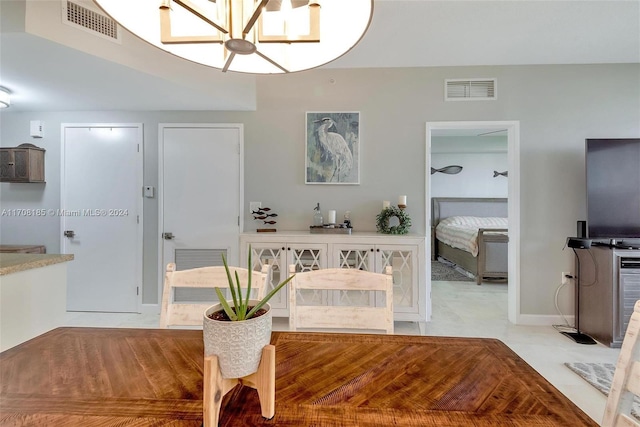 dining space featuring an inviting chandelier