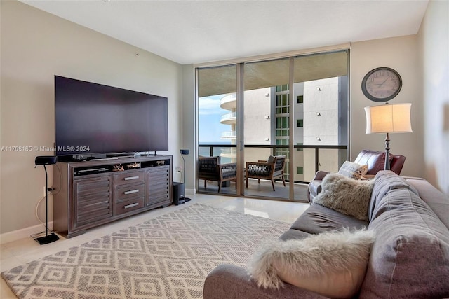 living room featuring floor to ceiling windows