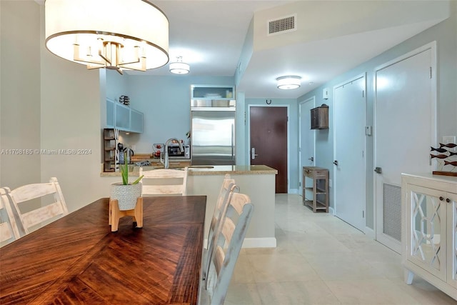 dining room featuring sink