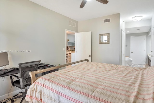 bedroom featuring ceiling fan, carpet floors, and ensuite bath