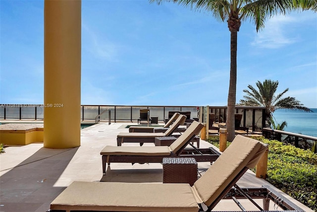 view of patio / terrace with a water view