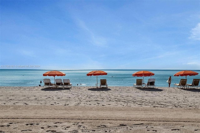 view of water feature with a beach view