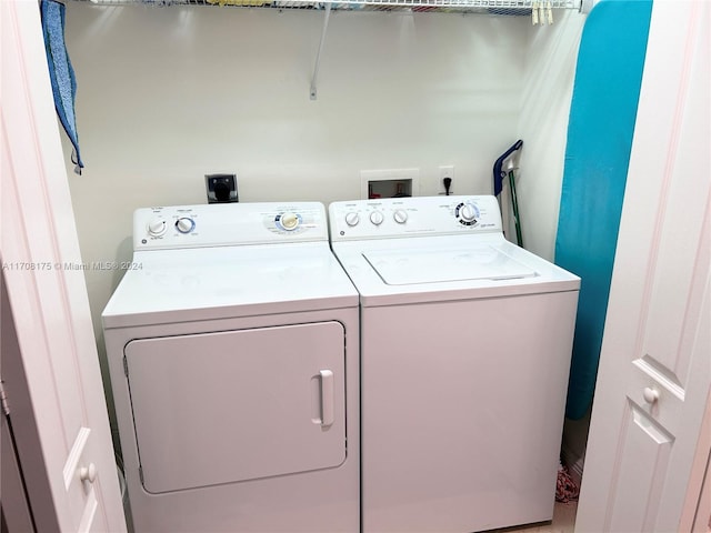 laundry room featuring washer and clothes dryer