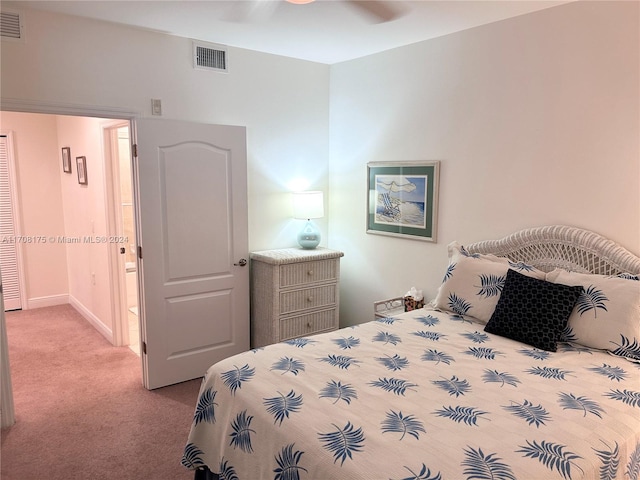 carpeted bedroom featuring ceiling fan