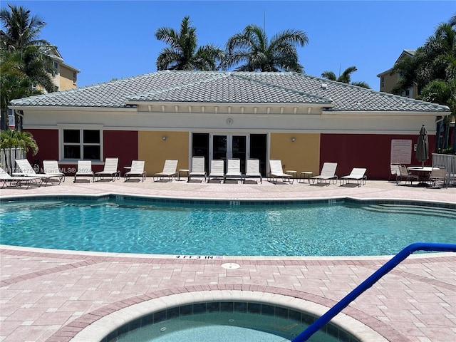 view of swimming pool featuring a patio area