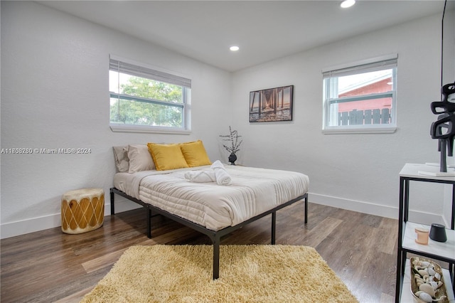 bedroom featuring hardwood / wood-style flooring