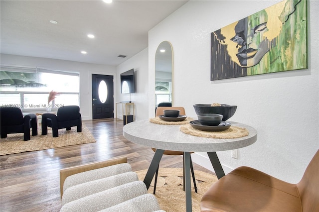 entryway with hardwood / wood-style floors