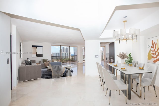 dining area featuring a chandelier