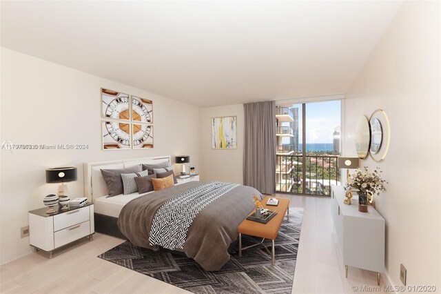 19667 Turnberry Way Unit 15A, Aventura, FL 33180 - bedroom featuring light wood-style floors and access to outside