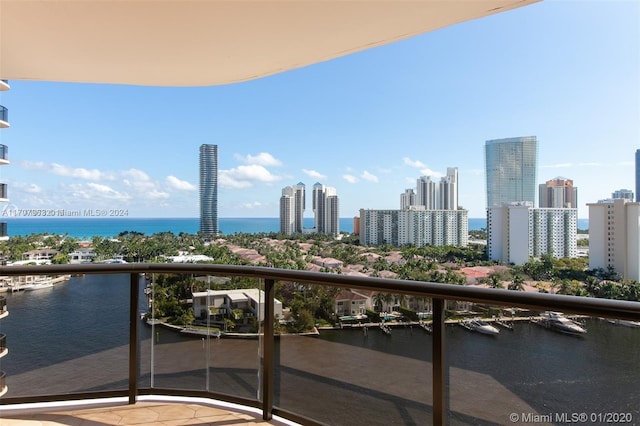 balcony featuring a water view