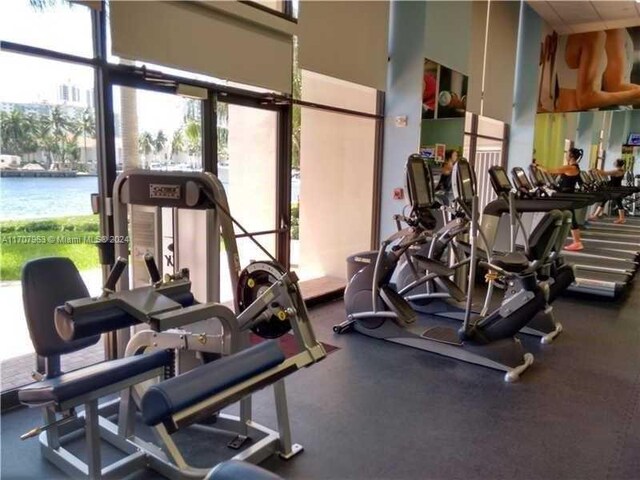 19667 Turnberry Way Unit 15A, Aventura, FL 33180 - exercise room with healthy amount of natural light