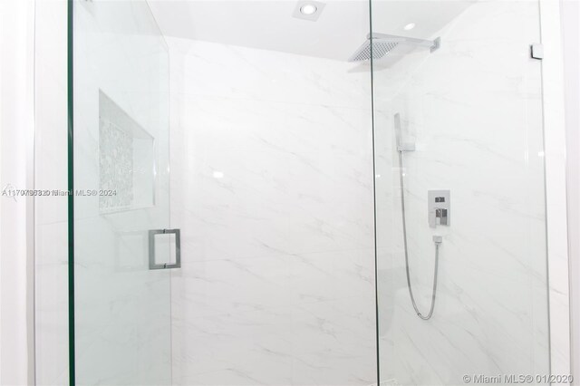 19667 Turnberry Way Unit 15A, Aventura, FL 33180 - full bathroom featuring a marble finish shower