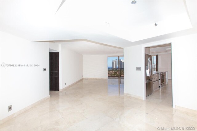 19667 Turnberry Way Unit 15A, Aventura, FL 33180 - unfurnished room with light marble finish flooring