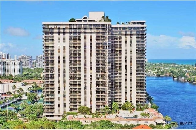 view of building exterior with a water view