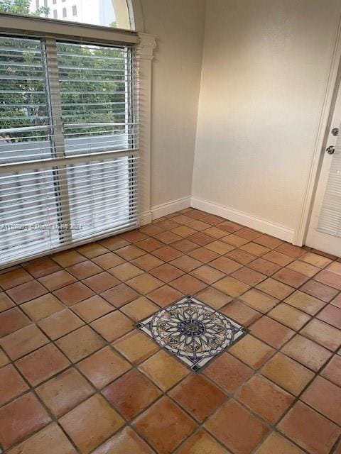 view of tiled spare room