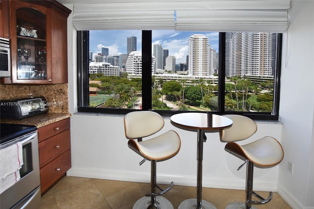 dining space with light tile patterned floors