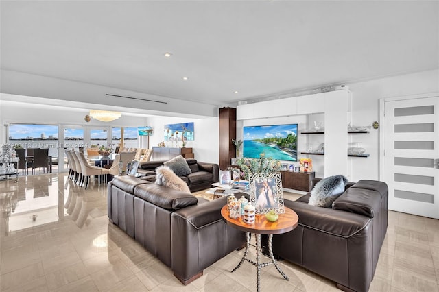 living room with light tile patterned floors