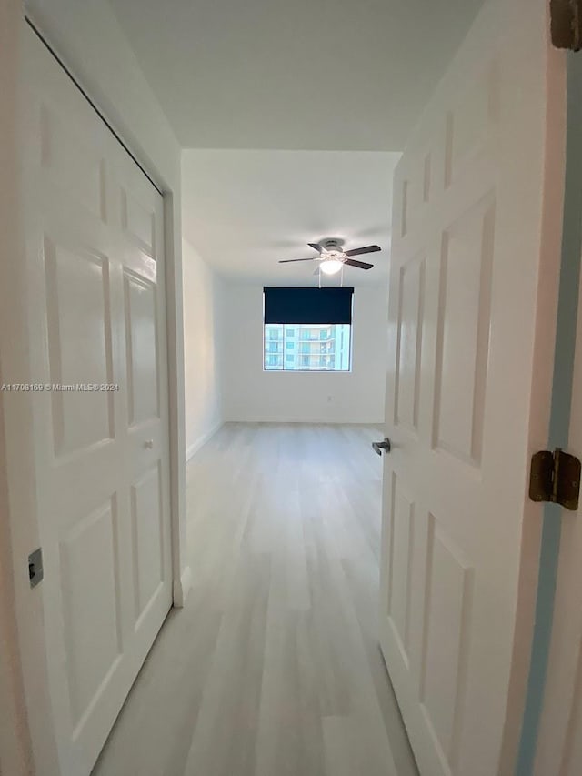 hallway featuring light hardwood / wood-style flooring