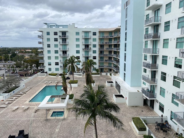 view of property with a community pool