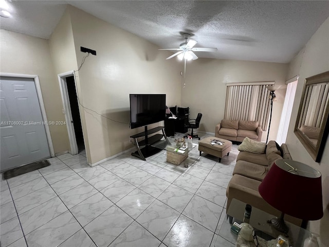 living room featuring a textured ceiling, ceiling fan, and lofted ceiling