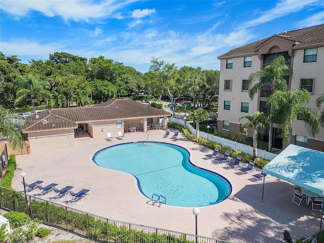 view of swimming pool featuring a patio