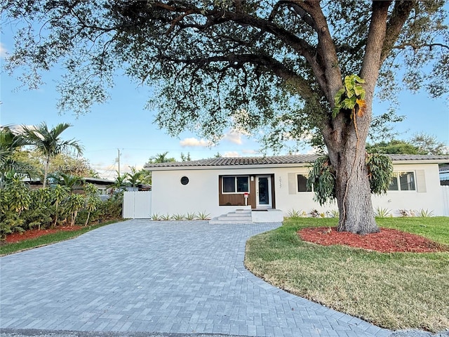 view of front of home with a front yard