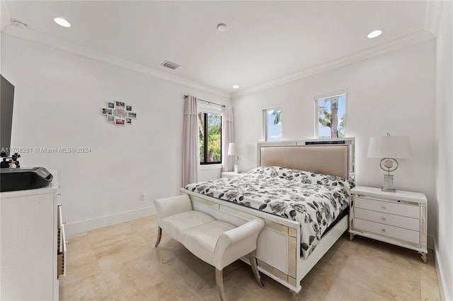 bedroom with ornamental molding