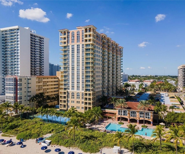 view of property with a community pool