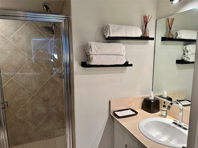 bathroom with vanity and walk in shower