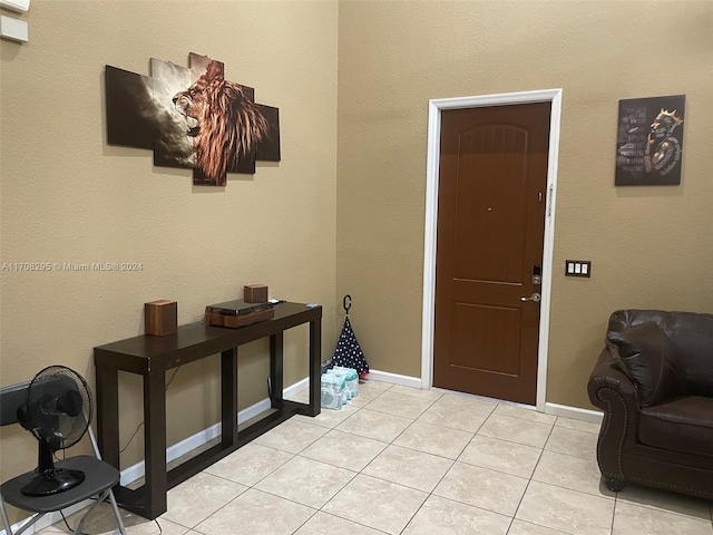 foyer featuring light tile patterned floors