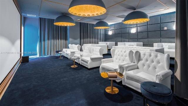 home theater room featuring carpet flooring