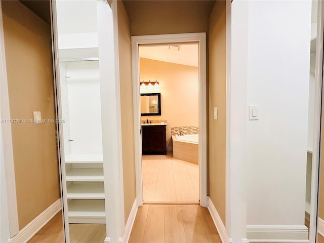 hall featuring hardwood / wood-style floors