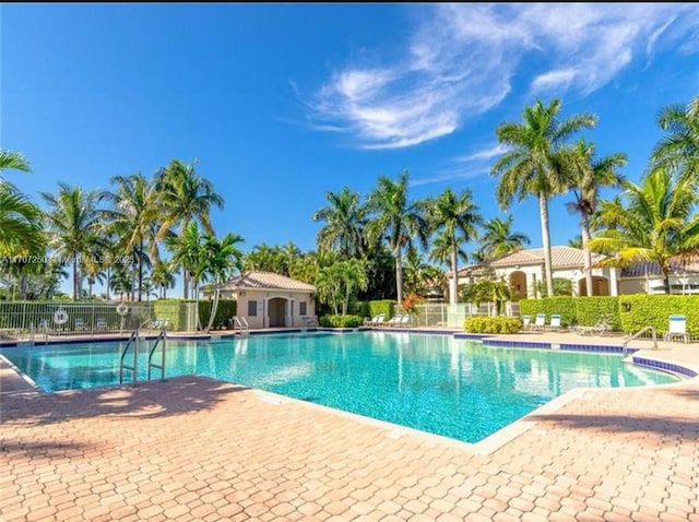 view of swimming pool featuring a patio