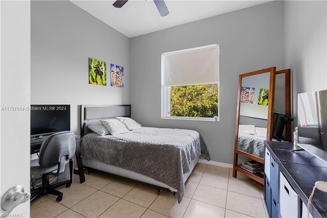 bedroom featuring ceiling fan and light tile patterned floors