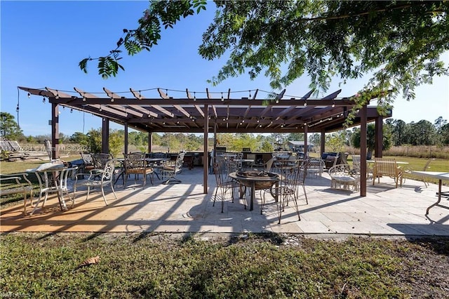 surrounding community featuring a pergola and a patio